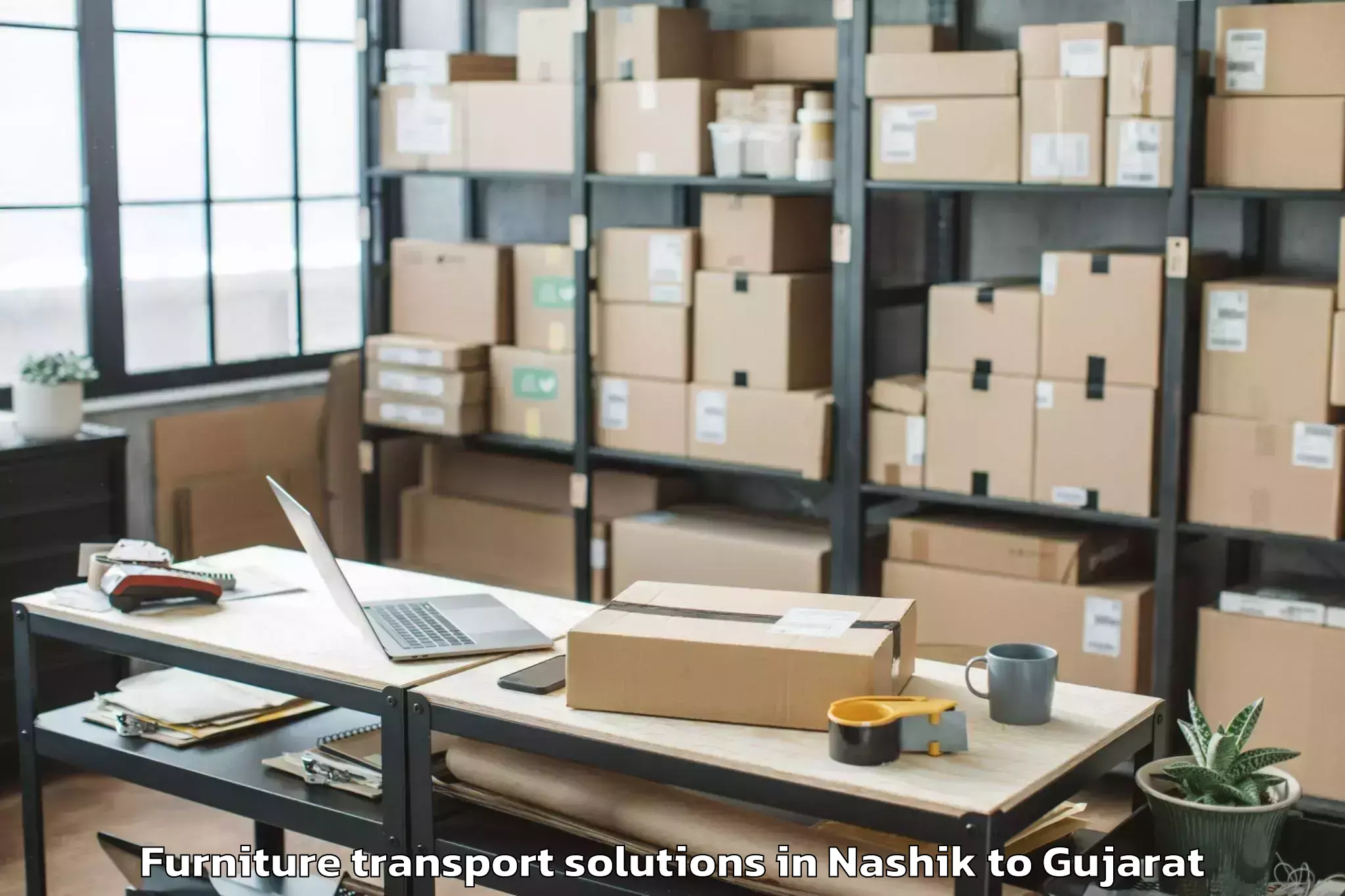 Book Nashik to Jhagadia Furniture Transport Solutions